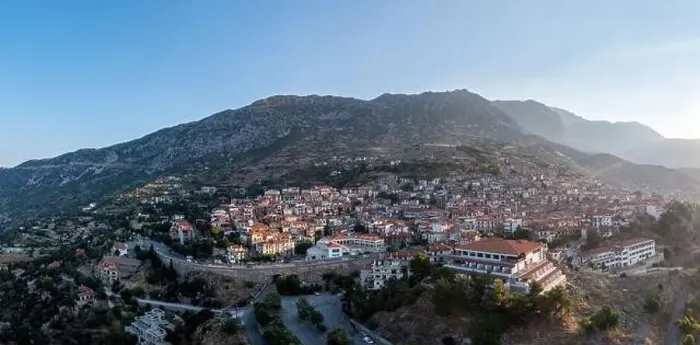 Framed Print : Arachova Greece mountain town aerial drone view at sunrise. Traditional houses famous tourist resort in Boeotia Framed Print : Arachova Greece mountain town aerial drone view at sunrise. Traditional houses famous tourist resort in Boeotia