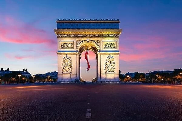 Arc de Triomphe de Paris at night in Paris, France