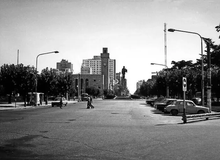Framed Print : ARG 259B Mar Del Plata Argentina 1973 central area with statue of San Martin street scene with men crossing road Framed Print : ARG 259B Mar Del Plata Argentina 1973 central area with statue of San Martin street scene with men crossing road