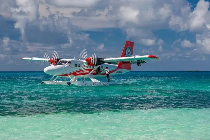 Framed Print : Ari Atoll, Maldives - 05.05.2019: Maldives seaplane on luxury resort, wooden jetty loading the plane, ready for departure. Tropical island background Framed Print : Ari Atoll, Maldives - 05.05.2019: Maldives seaplane on luxury resort, wooden jetty loading the plane, ready for departure. Tropical island background
