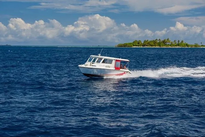Framed Print : Ari Atoll, Maldives - December 17, 2015: Tourist speedboat fast cruising in the sea at Maldives, Indian Ocean. Speed boat docking to pick up tourists Framed Print : Ari Atoll, Maldives - December 17, 2015: Tourist speedboat fast cruising in the sea at Maldives, Indian Ocean. Speed boat docking to pick up tourists