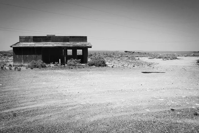 Framed Print : Arizona deserted dirt road wood building landscape architecture at two guns ghost town along route 66 just east of flagstaff