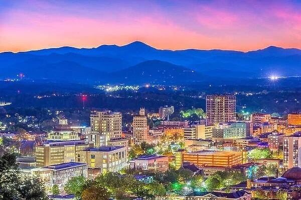Asheville, North Carolina, USA skyline over downtown with the Blue Ridge Mountains