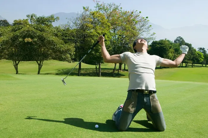 Framed Print : Asian man cheering on golf course Framed Print : Asian man cheering on golf course