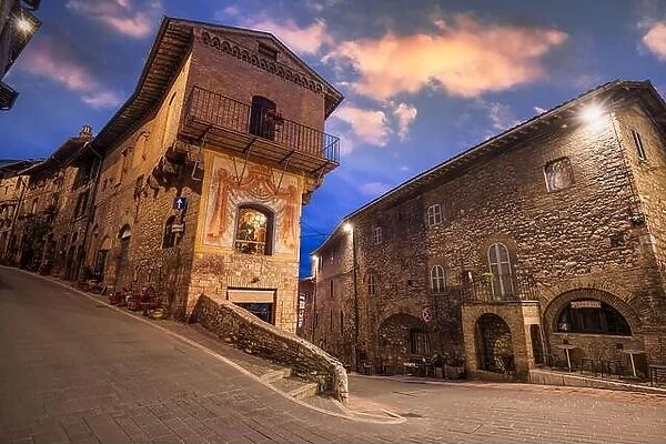 Assisi, Italy medieval town streets at dusk