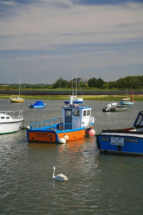 Framed Print : Assorted yachts and dingies in Keyhaven harbour Hampshire England UK Framed Print : Assorted yachts and dingies in Keyhaven harbour Hampshire England UK