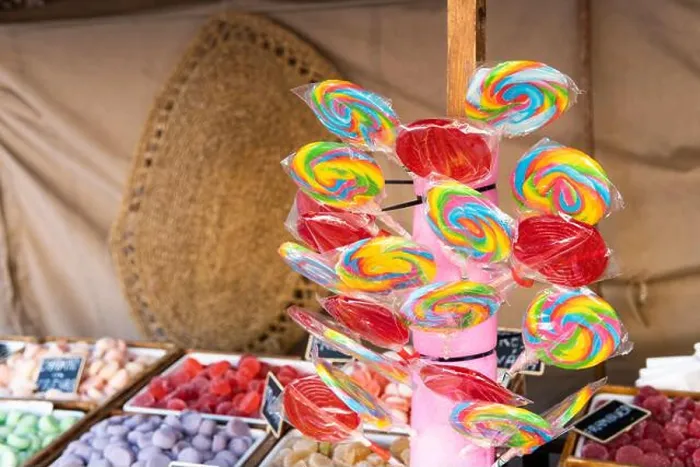 Framed Print : Assortment of lollipops and coloured jelly sweets in the shop. Traditional market, copy space Framed Print : Assortment of lollipops and coloured jelly sweets in the shop. Traditional market, copy space