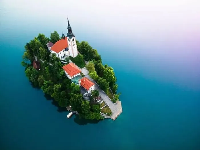 Framed Print : Assumption Church on Island on Lake Bled in Slovenia Aerial Drone View Framed Print : Assumption Church on Island on Lake Bled in Slovenia Aerial Drone View