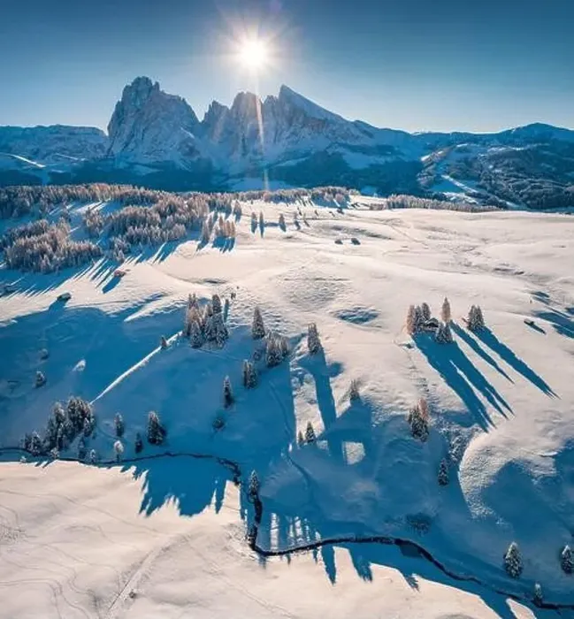 Framed Print : Astonishing view from flying drone of Alpe di Siusi village with Plattkofel peak on background Framed Print : Astonishing view from flying drone of Alpe di Siusi village with Plattkofel peak on background