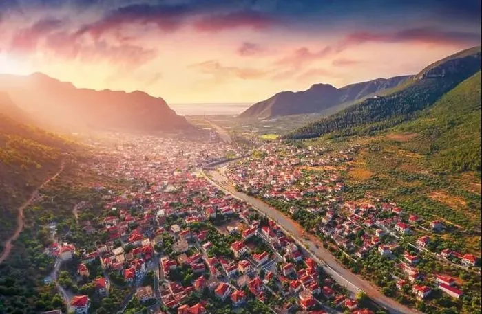 Framed Print : Astonishing view from flying drone of Leonidio town Framed Print : Astonishing view from flying drone of Leonidio town