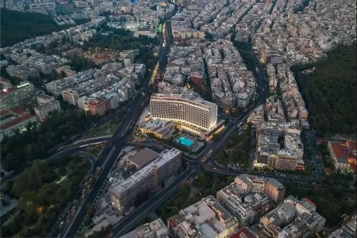 Framed Print : Athens, Greece - August 16, 2019: Aerial drone shot of Hilton Athens hotel with pool in dusk time Framed Print : Athens, Greece - August 16, 2019: Aerial drone shot of Hilton Athens hotel with pool in dusk time