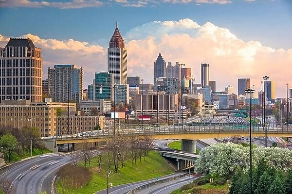 Atlanta, Georgia, USA downtown city skyline over highways at dusk