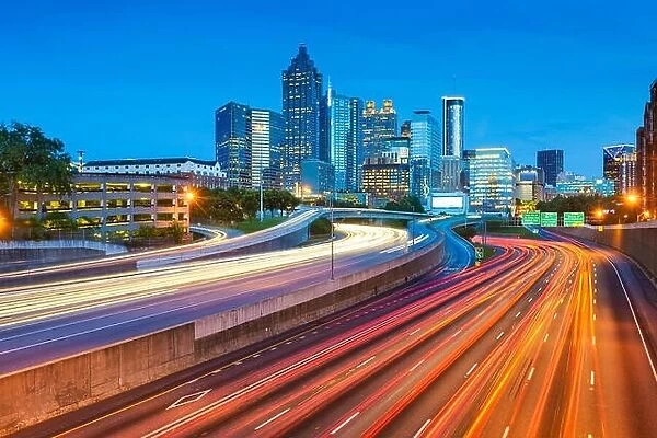 Atlanta, Georgia, USA downtown skyline and highway at dusk