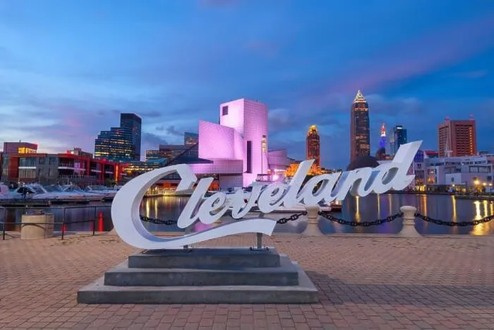 Framed Print : AUGUST 10, 2019 - CLEVELAND, OHIO: The landmark skyline of downtown Cleveland from Voinovich Bicentennial Park in the early morning Framed Print : AUGUST 10, 2019 - CLEVELAND, OHIO: The landmark skyline of downtown Cleveland from Voinovich Bicentennial Park in the early morning