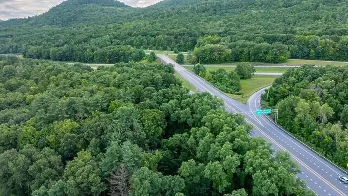 Framed Print : August 20 2024, Sunny afternoon summer aerial image of the interstate, I 87 north of Lake George, NY, USA Framed Print : August 20 2024, Sunny afternoon summer aerial image of the interstate, I 87 north of Lake George, NY, USA