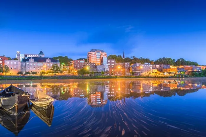Framed Print : Augusta, Maine, USA town skyline on the Kennebec River at dusk