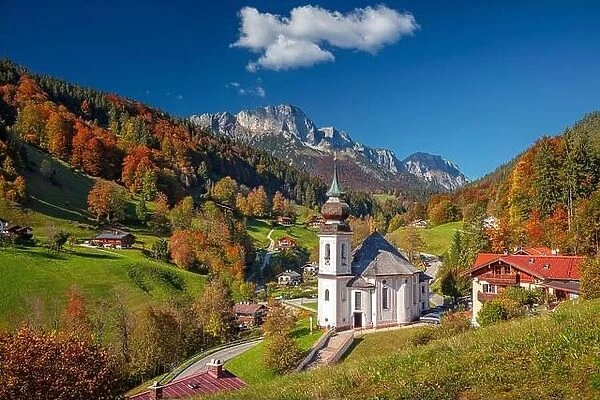 Autumn in Alps. Image of the Bavarian Alps with Maria Gern Church during beautiful autumn day