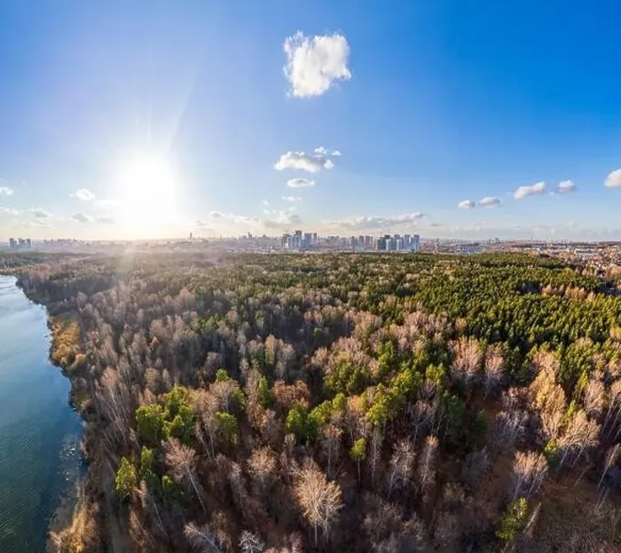 Framed Print : Autumn forest on lake shore at sunset and city on horizon, auerial view. Lake Shartash and Yekaterinburg, Russia Framed Print : Autumn forest on lake shore at sunset and city on horizon, auerial view. Lake Shartash and Yekaterinburg, Russia