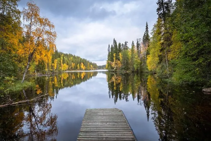 Framed Print : Autumn landscape with idyllic lake and fall colors at daytime in Hossa, National Park, Finland Framed Print : Autumn landscape with idyllic lake and fall colors at daytime in Hossa, National Park, Finland