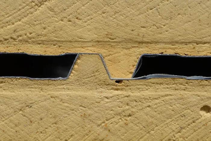 Framed Print : Background of plastic foam cladding on a building site