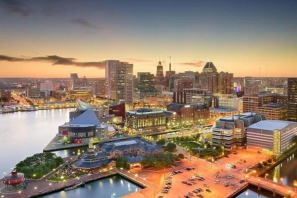 Baltimore, Maryland, USA inner harbor and downtown skyline at dusk