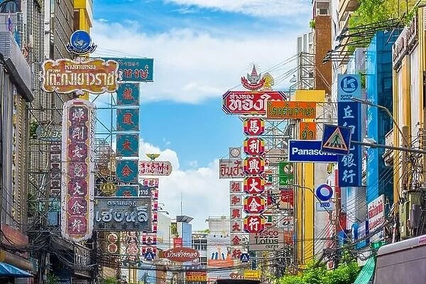 BANGKOK, THAILAND - SEPTEMBER 27, 2015: Colorful signs line Yaowarat Road in the Chinatown district of Bangkok