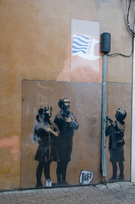 Framed Print : Banksy graffitti of raising Tesco bag protected by plastic Essex Road Islington London Framed Print : Banksy graffitti of raising Tesco bag protected by plastic Essex Road Islington London