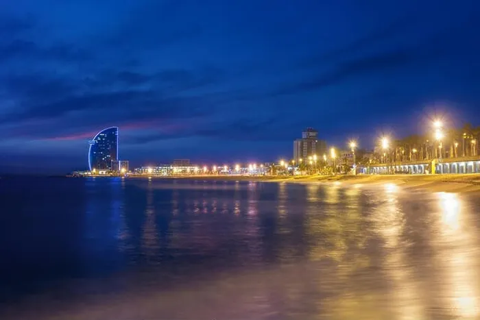 Framed Print : Barcelona Beach in summer night along seaside in Barcelona, Spain. Mediterranean Sea in Spain Framed Print : Barcelona Beach in summer night along seaside in Barcelona, Spain. Mediterranean Sea in Spain