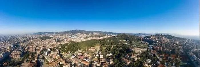 Framed Print : Barcelona, Spain - Feb 25, 2020: Aerial panorama drones shot of park on hill outside Barcelona city in winter morning Framed Print : Barcelona, Spain - Feb 25, 2020: Aerial panorama drones shot of park on hill outside Barcelona city in winter morning