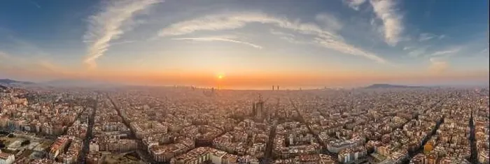 Framed Print : Barcelona, Spain - Feb 25, 2020: Aerial panorama shot of Barcelona coastline sun rising over horizon in winter morning Framed Print : Barcelona, Spain - Feb 25, 2020: Aerial panorama shot of Barcelona coastline sun rising over horizon in winter morning