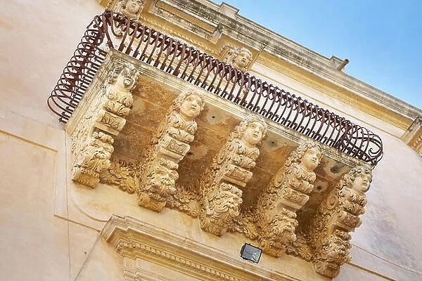 Baroque details of balcony at the Palazzo Villadorata (Palazzo Nicolaci), Noto old town, Sicily, Italy UNESCO