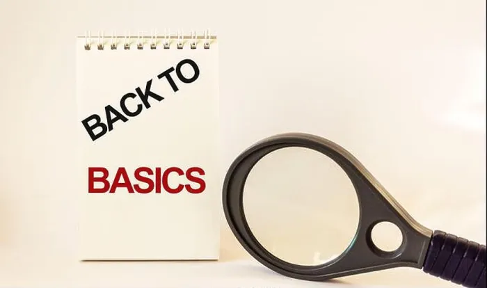 Framed Print : BACK TO BASIC, text written on notepad and white background, near a magnifying glass Framed Print : BACK TO BASIC, text written on notepad and white background, near a magnifying glass