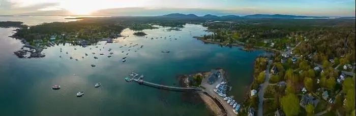 Framed Print : Bass Harbor and village aerial view at sunset with Mountains in Acadia National Park at the background in town of Framed Print : Bass Harbor and village aerial view at sunset with Mountains in Acadia National Park at the background in town of