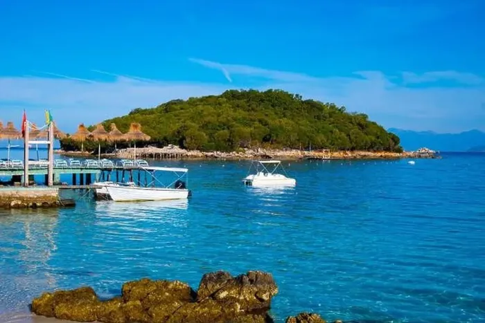Framed Print : Bay in the city of Ksamil with ships and islands. Ionian Sea in Albania Framed Print : Bay in the city of Ksamil with ships and islands. Ionian Sea in Albania