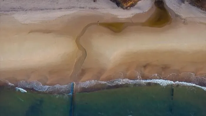 Framed Print : Beach from above: Sun-kissed sands, calm ocean