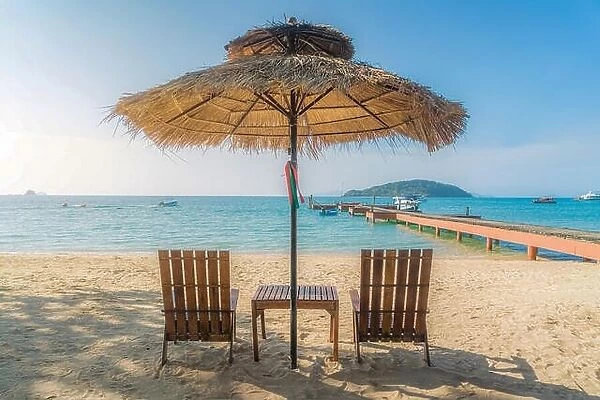 Beach Chairs and Umbrella on summer island in Phuket, Thailand. Summer, Travel, Vacation and Holiday concept