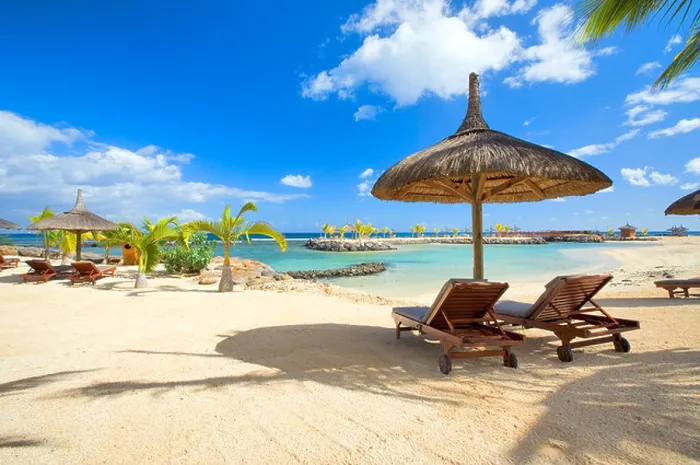 Framed Print : Beach scene with straw parasols, Mauritius Framed Print : Beach scene with straw parasols, Mauritius