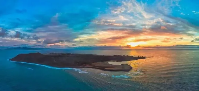 Framed Print : Beautiful aerial panoramic image of the sunrise over Lobos island Corralejo Fuerteventura Framed Print : Beautiful aerial panoramic image of the sunrise over Lobos island Corralejo Fuerteventura
