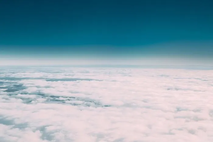 Framed Print : Beautiful Aerial View Of Sunny Clear Sky Over White Fluffy Clouds From Height Flight Of Plane. Bright White And Blue Colors Of Sunny Sky Framed Print : Beautiful Aerial View Of Sunny Clear Sky Over White Fluffy Clouds From Height Flight Of Plane. Bright White And Blue Colors Of Sunny Sky