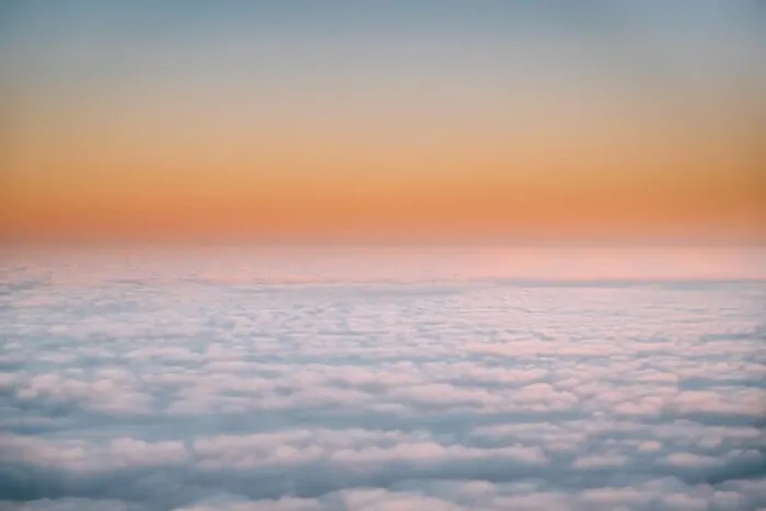 Framed Print : Beautiful Aerial View Of Sunny Clear Sky Over White Fluffy Clouds From Height Flight Of Plane. Bright Orange And Yellow Colors Of Sunny Sky. Natural B Framed Print : Beautiful Aerial View Of Sunny Clear Sky Over White Fluffy Clouds From Height Flight Of Plane. Bright Orange And Yellow Colors Of Sunny Sky. Natural B