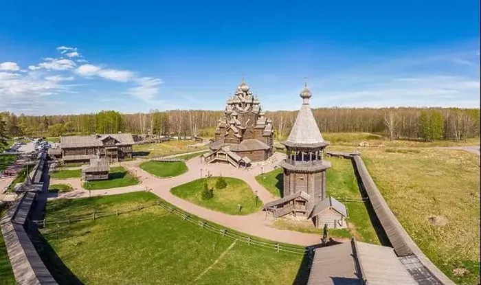 Framed Print : Beautiful Aerial view to traditional Russian village with orthodox wooden chapel and bell tower in Bogoslovka manor Framed Print : Beautiful Aerial view to traditional Russian village with orthodox wooden chapel and bell tower in Bogoslovka manor