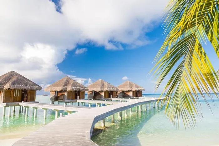 Framed Print : Beautiful beach scene water bungalows. Summer holiday and vacation concept background. Inspirational tropical landscape design Framed Print : Beautiful beach scene water bungalows. Summer holiday and vacation concept background. Inspirational tropical landscape design