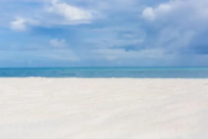 Framed Print : Beautiful beach with white sand, turquoise ocean water and blue sky with clouds in sunny day. Seascape abstract beach background. blur bokeh light