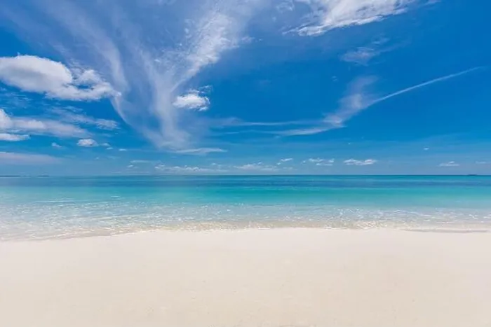 Framed Print : Beautiful beach with white sand, turquoise ocean water and blue sky with clouds in sunny day. Panoramic view. Natural background for summer vacation Framed Print : Beautiful beach with white sand, turquoise ocean water and blue sky with clouds in sunny day. Panoramic view. Natural background for summer vacation