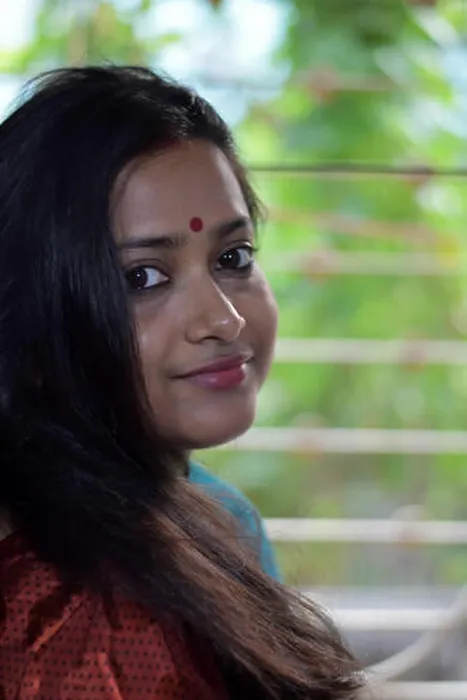 Framed Print : A beautiful bengali lady, standing infront of a window is turning her head to look at someone Framed Print : A beautiful bengali lady, standing infront of a window is turning her head to look at someone