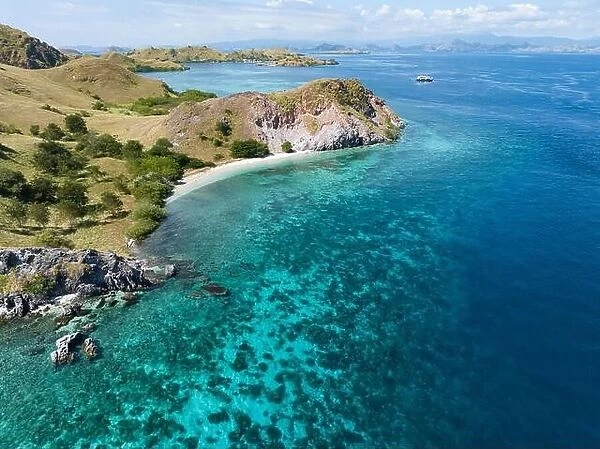 Beautiful and biodiverse coral reefs and idyllic beaches are found on the island of Sebayor in Komodo National Park, Indonesia