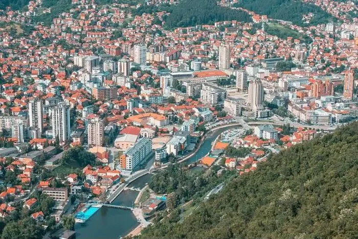 Framed Print : Beautiful city view of Uzice city, Serbia from above, highlighting the European architecture and the vibrant landscape Framed Print : Beautiful city view of Uzice city, Serbia from above, highlighting the European architecture and the vibrant landscape