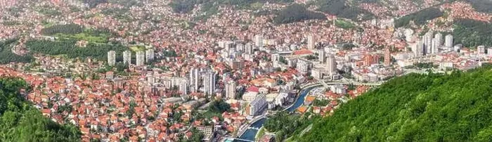 Framed Print : Beautiful city view of Uzice city, Serbia from above, highlighting the European architecture and the vibrant landscape Framed Print : Beautiful city view of Uzice city, Serbia from above, highlighting the European architecture and the vibrant landscape