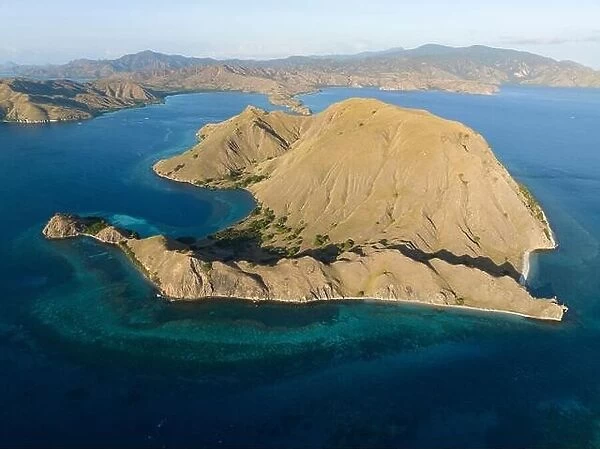 Beautiful coral reefs and idyllic beaches are found on Gili Darat in Komodo National Park, Indonesia. This area has high marine biodiversity