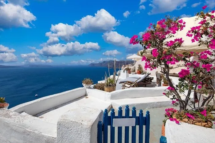 Framed Print : Beautiful details of the island of Santorini, white houses, blue doors and shutters, scenic views of the Aegean Sea. Summer travel landscape, rural